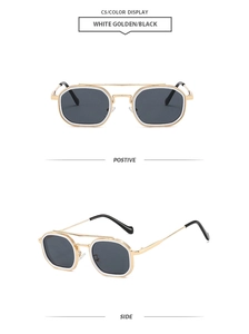 Detail of white golden double-bridge hexagonal sunglasses with black lenses and metal frame