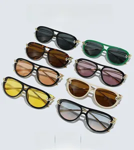 Collection of retro double-bridge pilot sunglasses with chain temples in multiple colors