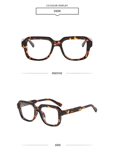 Detailed front and side view of classic tortoiseshell square frame glasses with metal studs