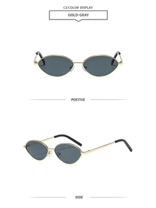 Detail view of oval metal sunglasses with gold frames and gray lenses shown from two angles