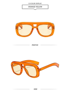 Détails des lunettes de soleil orange-jaune à double pont et verres teintés
