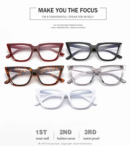 Five assorted retro square eyewear frames in red black tortoiseshell grey and white