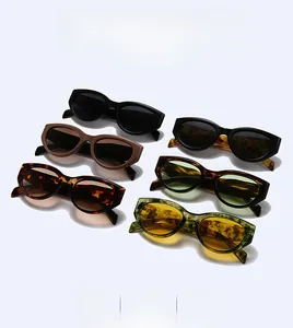 Flat lay of retro cat eye sunglasses in six stylish colors with thick frames