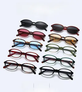 Multiple vintage oval sunglasses in diverse colors including tortoiseshell and tinted lenses