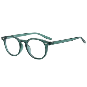 Classic round translucent dark green eyeglass frames with rivets shown at a 45-degree angle