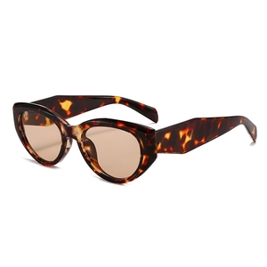 Vintage cat eye tortoiseshell sunglasses with light brown lenses in a 45-degree angle view