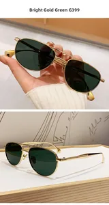 Dettaglio di occhiali da sole aviator con montatura in metallo oro e lenti verde scuro