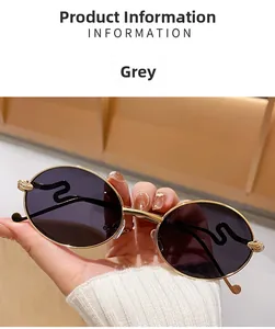 Vue détaillée des lunettes de soleil ovales en métal vintage avec verres gris et branches fines