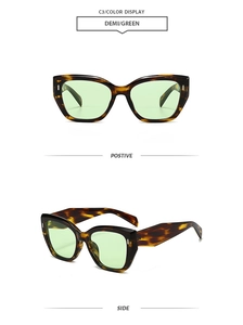 Front and side views of oversized demi tortoise shell sunglasses with green lenses