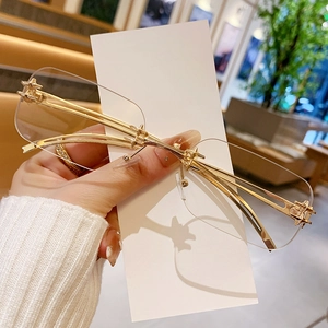 Fashion rimless rectangle sunglasses with gold metal frame and clear cut-edge lenses