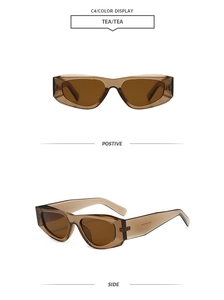 Détail de lunettes de soleil translucides couleur thé avec verres bruns élégants