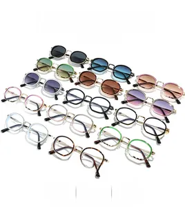 Detailed grid showing vintage round sunglasses with various frame colors and lens tints