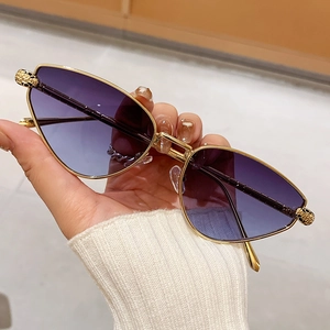 Fashion cat eye sunglasses with purple gradient lenses and gold leopard metal accents