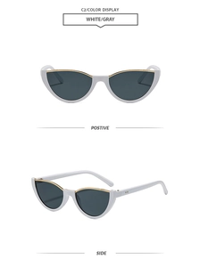 Vue détaillée des lunettes de soleil œil-de-chat blanches avec verres gris et métal doré