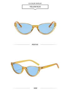 Lunettes de soleil cat-eye rétro avec monture orange transparent et verres bleus