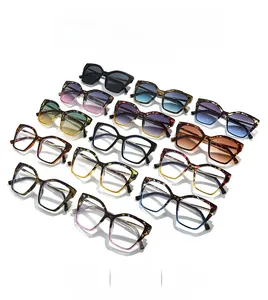 Flat lay of retro square oversized sunglasses in various colors and gradient lenses