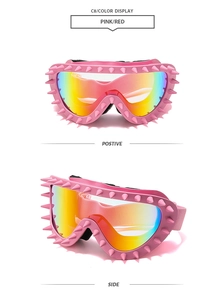 Detail view of pink punk goggles with sharp rivets and iridescent rainbow mirrored lenses