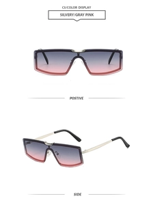 Detail view of large metal frame rimless sunglasses with silver gray pink gradient lenses