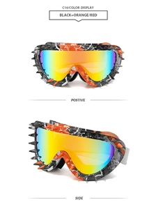 Detail view of punk camouflage sports goggles with spikes and rainbow lenses