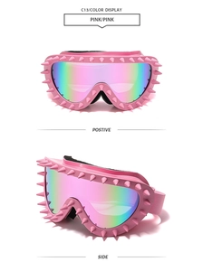 Detail of punk pink sunglasses with metallic rivets and iridescent lenses for skiing