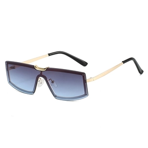Fashionable oversized frameless sunglasses with gradient purple lenses and gold metal frame