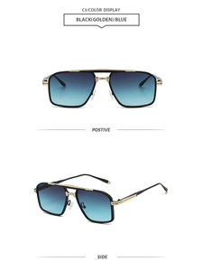 Detail view of stylish aviator sunglasses with gold accents and blue gradient lenses