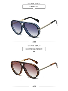 Détails de lunettes de soleil aviateur vintage avec montures bleu rayé et écaille