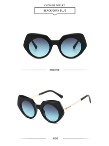 Detailansicht der schwarzen geometrischen Sonnenbrille mit blauem Verlauf und Metallbügeln