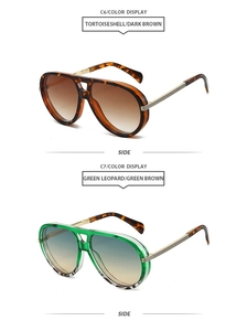 Détails de lunettes pilote avec monture écaille et accents métalliques dorés aux branches