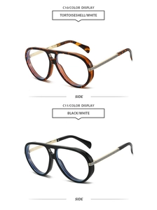 Détail de lunettes aviateur rétro en écaille et noir avec branches en métal doré