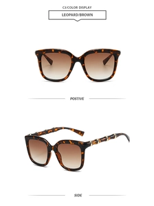 Detail of vintage square leopard sunglasses with bamboo-style gold metal temples
