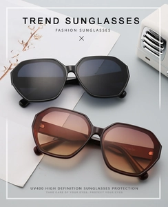 Detail of vintage oversized sunglasses with UV400 protection and stylish wide temples