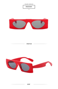 Front and side views of chunky bright red sunglasses with dark grey oval lenses
