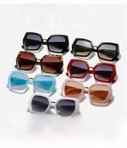Detailed display of oversized hexagonal sunglasses in seven trendy assorted candy colors