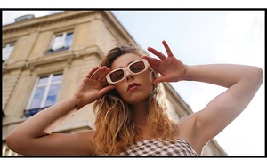 Chic beige rectangular thick frame sunglasses with gradient lenses in a street style shot