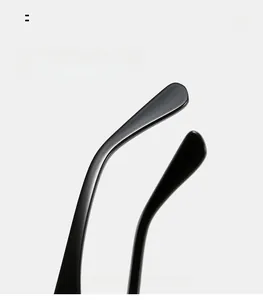 Detail view of ergonomic curved black mirror legs for comfortable sunglasses wearing