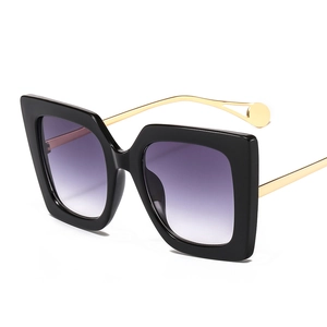 Square oversized sunglasses with black frames, purple gradient lenses and gold metal temples