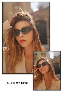 Detail view of black geometric sunglasses with thick frames and dark lenses in street style