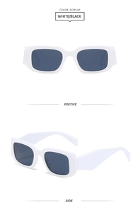 Detail view of white rectangle sunglasses with wide temples and dark grey lenses