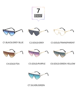Collection of seven oversized cat-eye sunglasses with gradient lenses and metal frames