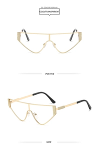 Detail of gold metal cat-eye glasses frame with textured sides and transparent lenses