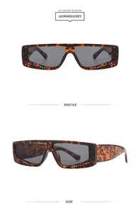 Detail of leopard square sunglasses with colorful rhinestones on frame, grey lenses