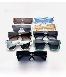 Close-up of square oversized sunglasses with silver star bridge detail in multiple colors