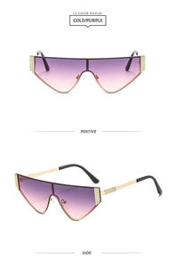 Detail of shield sunglasses with gold metal frames and purple gradient lenses