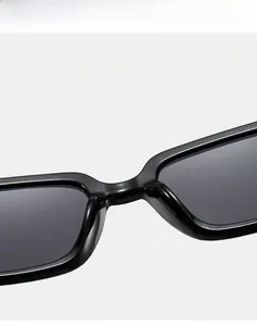 Macro shot of high-quality polished black square frame sunglasses with UV gray lenses