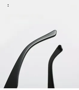Detail of glossy black curved temple legs for retro small frame sunglasses comfort