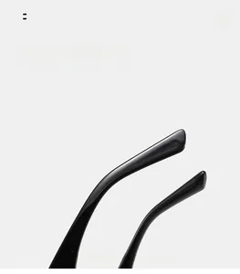 Detail view of the curved mirror legs on black sunglasses for comfortable daily wear