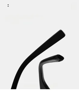 Detail view of curved mirror legs on black sunglasses for comfortable wearing experience
