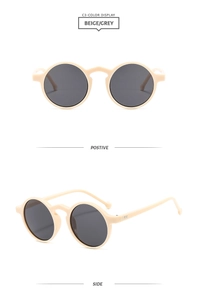 Front and side view of vintage beige round frame sunglasses with dark grey lenses