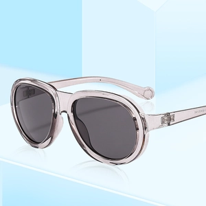 Fashionable oversized sunglasses with transparent grey-purple frames and dark grey lenses